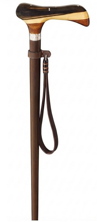 Canne de marche Derby, canne de marche luxe homme, canne de Dandy, canne de marche sur-mesure, canne de marche personnalisée. The Derby collection of luxury walking canes are made to measure and are luxurious walking sticks adapted to the morphology of your hand.